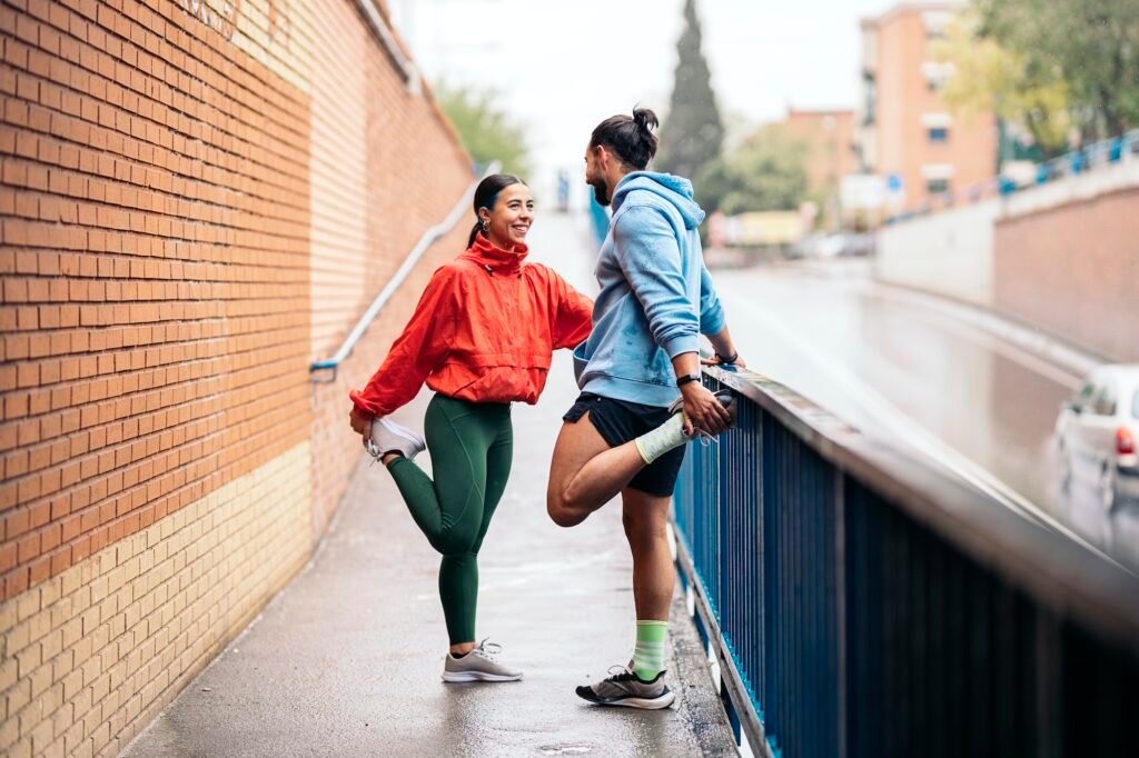 Runners Stretching After Workout